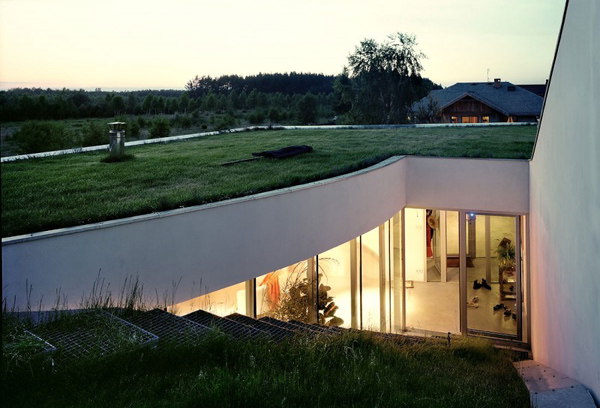 3 Houses Integrated Into Land