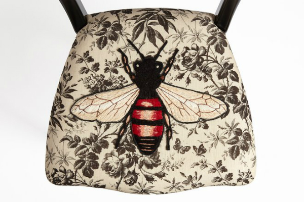 Printed Gucci chair with a bee applique