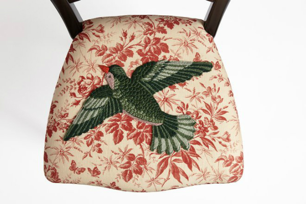 Printed Gucci chair with a bird applique