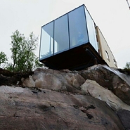 Resort Cabins in Norway Hang Over Water