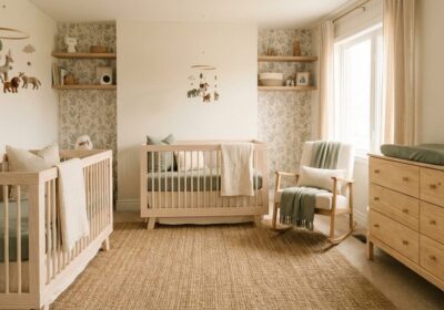 Twins nursery room with matching cribs and decor